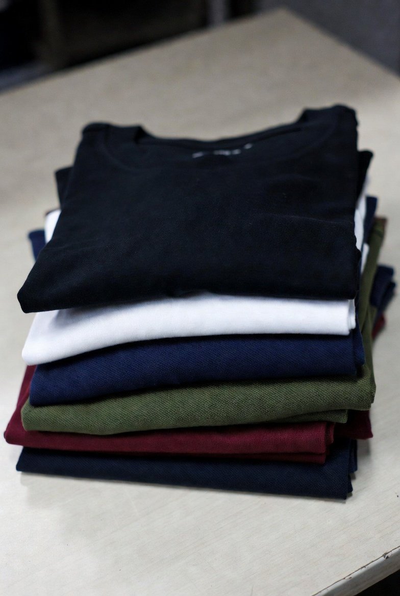 Folded cotton tees and pique polos
